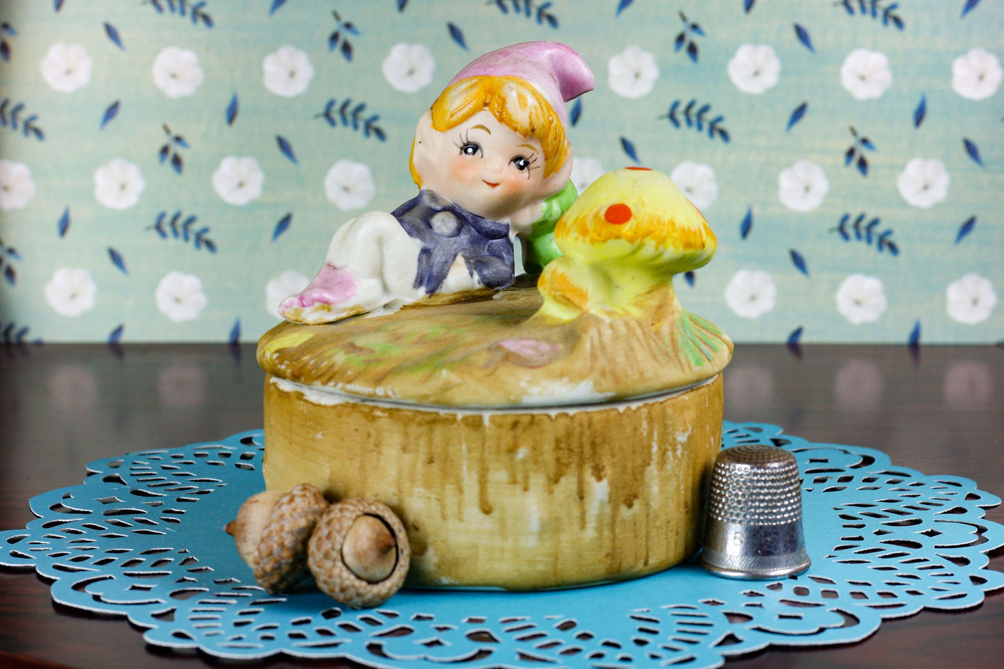 Vintage Trinket Box with Whimsical Woodland elf baby relaxing on a mushroom patch on a tree trunk Kitschy 1970's Ceramic Bisque Jewelry Box