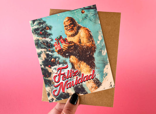 Kitschy Big Foot Christmas Card - Feliz Navidad Cryptozoology Holiday Greeting Cards, Funny Cryptid Gift for Cryptozoologist, Weird Stuff