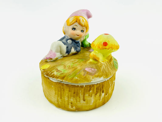 Vintage Trinket Box with Whimsical Woodland elf baby relaxing on a mushroom patch on a tree trunk Kitschy 1970's Ceramic Bisque Jewelry Box