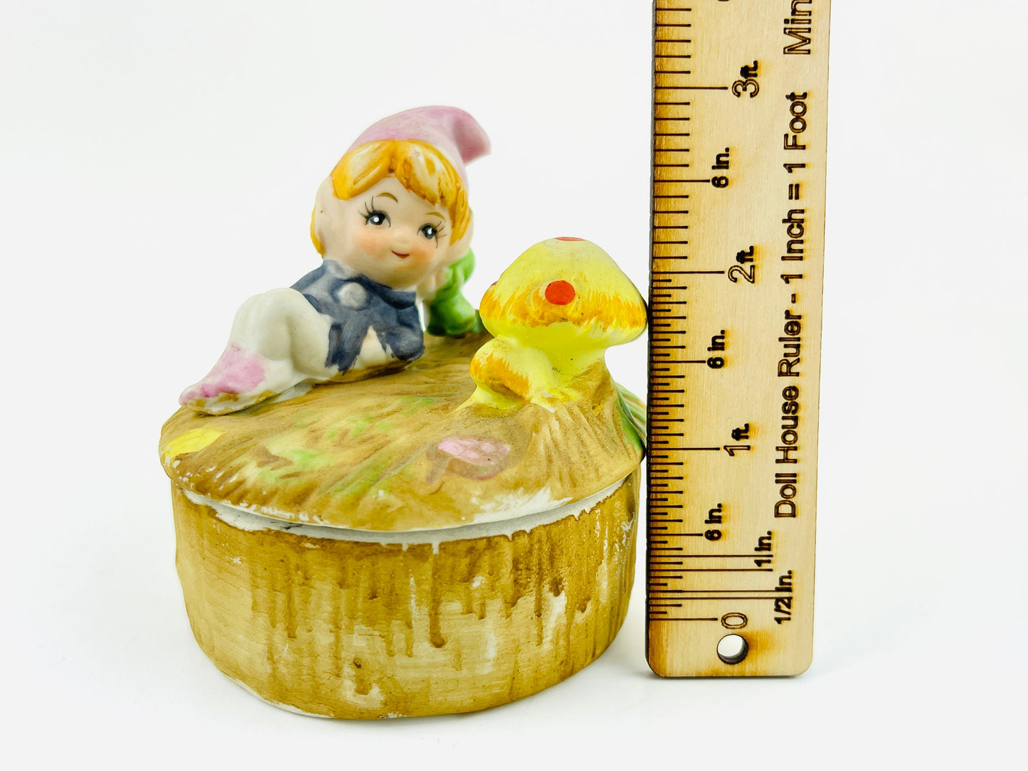 Vintage Trinket Box with Whimsical Woodland elf baby relaxing on a mushroom patch on a tree trunk Kitschy 1970's Ceramic Bisque Jewelry Box